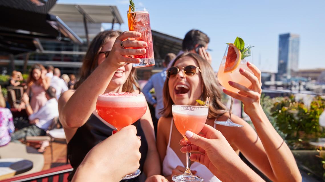 Ladies cheersing cocktails Smoke
